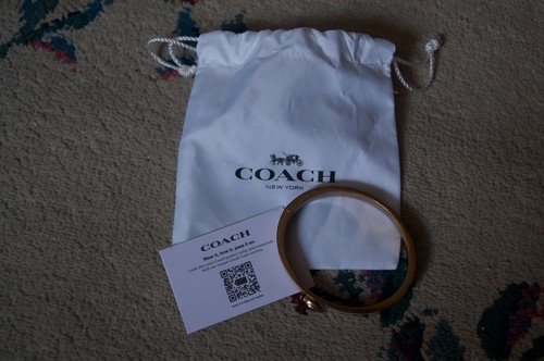 Coach pale pink and - pink, gold
